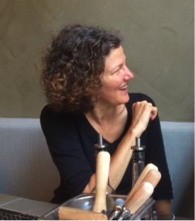 A picture of Tina Clarke chatting with others